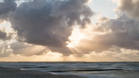 Golden sunset with dramatic cloudscape over the sea Stock Footage 116423180