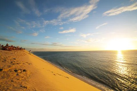 Golden sunset on dune Stock Photos