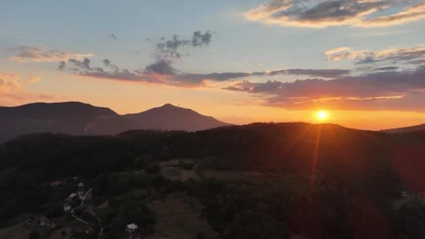 Golden sunset light falls behind Trebevic mountain ridges Video stock 314366144