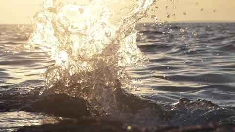Golden Sunset Ocean Splash Close-Up Of Waves And Water Droplets At Shore Stock Footage 337418356