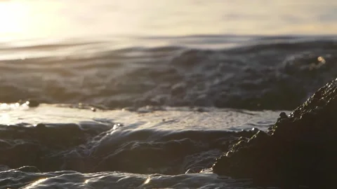Golden Sunset Ocean Wave Closeup With Splashing Sea Water and Reflective Surf Stock Footage 337419685