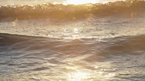 Golden Sunset Ocean Waves With Sparkling Water Surface Stock Footage 337418636