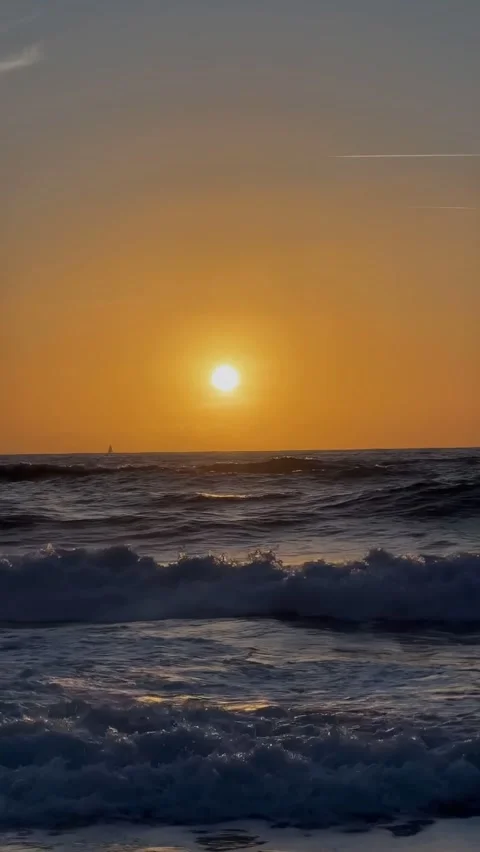 Golden sunset over Atlantic Ocean waves, relaxing sea montage, Portugal Stock Footage 346582487