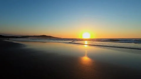 Golden sunset over the beach at San Vicente de la Barquera, Spain, with oce.. Stock Footage 343226824
