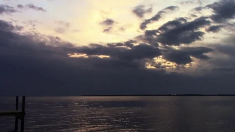 Golden Sunset over Large Dark Lake Stock Footage