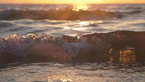 Golden Sunset Over Ocean Waves With Shimmering Reflection On The Shoreline Stock Footage 337419785