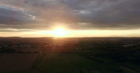 Golden Sunset Over Patchwork Fields and City 動画素材 84340048