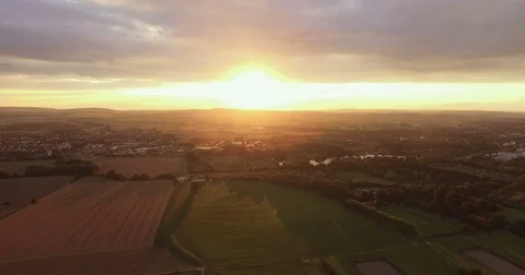 Golden Sunset Over Patchwork Fields and Town 動画素材 84340847