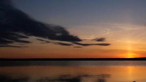 Golden sunset over tranquil lake Stock Footage 91069316