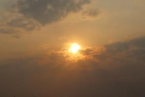 Golden Sunset Rays, Cloudscape, and Dramatic Sky, Evening Sky, Yellow Sky 写真素材