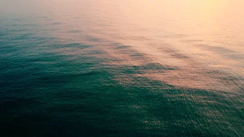 Golden Sunset Reflecting On A Beach Stock Footage 156719405