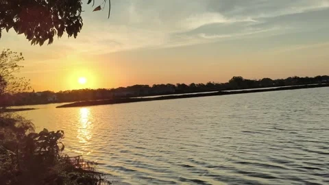 Golden Sunset Reflection on Calm River at Dusk 스톡 동영상 341506040
