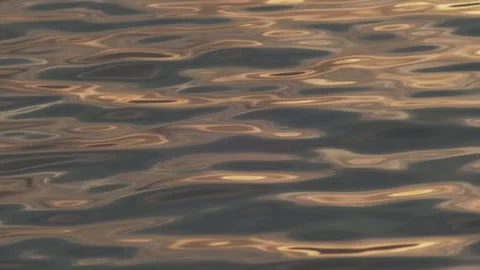 Golden Sunset Reflection on Calm Sea Surface Water Texture Видео 334163347