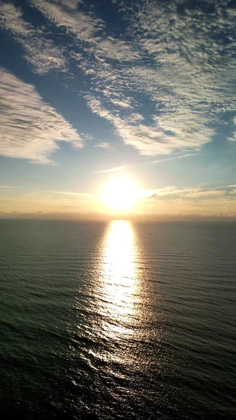Golden Sunset Reflection on Gulf of Mexico – Vertical Drone Footage Stock Footage 330698798