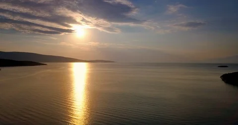 Golden sunset reflection on sea surface  Stock Footage 107946014
