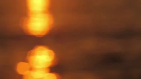 Golden sunset reflection on waves Stock Footage 10569142