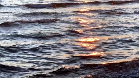 Golden Sunset Reflections on Gentle Ocean Waves Ripple Texture Vídeo Stock 331027683