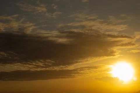 Golden Sunset Sky with Clouds Fotos Stock