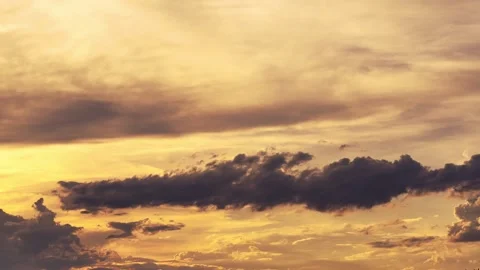 Golden Sunset Sky with Dramatic Clouds and Atmospheric Lighting Stock Footage 316263908