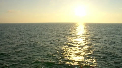 Golden sunset slow-motion deck view with big sun Stock Footage 2203979