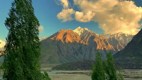 Golden Sunset on Snow Capped Mountains in Nubra Valley Ladakh, India. Stock Footage 338224407