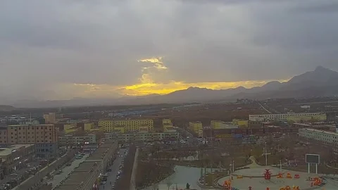 Golden Sunset Time-lapse Over Wuqia City at China's Westernmost Point Video stock 332384636