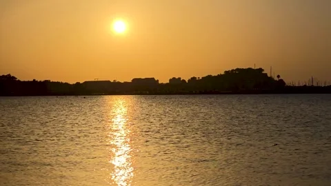 Golden Sunset Time Lapse Over Denia Castle and Marina Sea Reflection Stock Footage 341983548