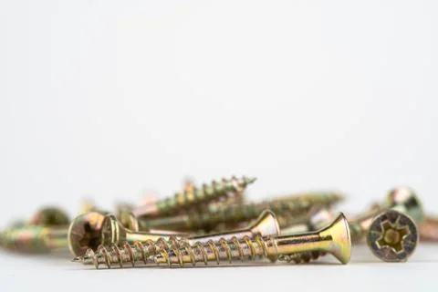 Golden tapping screws Stock Photos