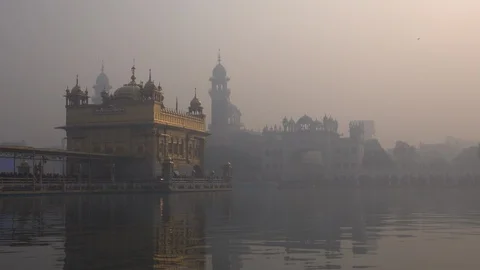 Golden Temple and air pollution in Amritsar, India Stock Footage