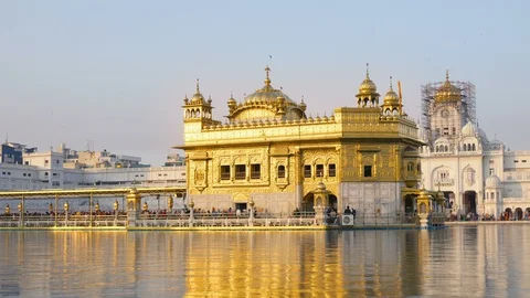 Golden Temple Timelapse With Gold Reflection in Holy Pool of Water - Amritsar Stock Footage 129407449