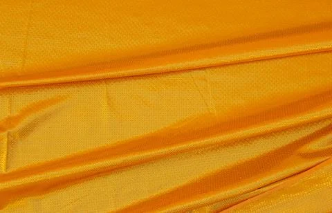 Golden Thai pattern fabric texture for background Stock Photos