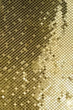 Golden tiles pattern background on wall Stock Photos