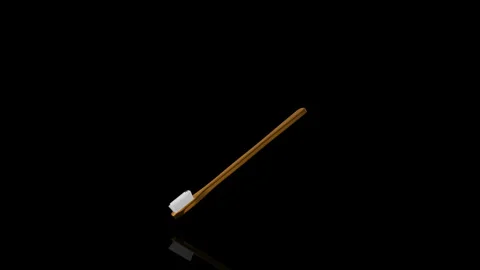 Golden Toothbrush turns on itself - loop animation Stock Footage 253600704