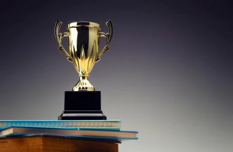 Golden trophy on stack of book for education success concept. Foto stock