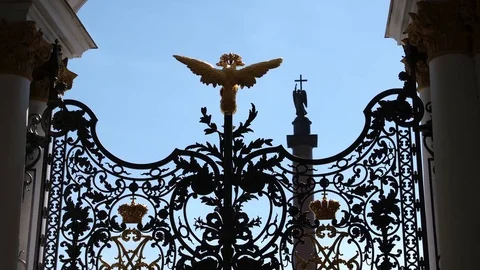 Golden two-headed eagle sculpture on an iron gate of the State Hermitage Stock Footage 84131181