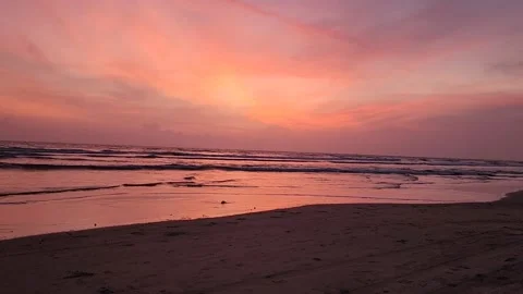 Golden Waves: Capturing the Magic of Sunset at the Beach Stock Footage 236570815