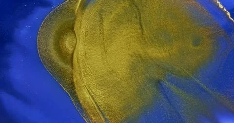 Golden waves flow over blue paint abstract background. Slow motion. Golden Stock Illustration