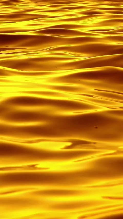 The golden waves of the ocean, with a texture like liquid gold Stock Footage 336948511