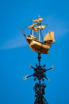 Golden wind vane Stock Photos