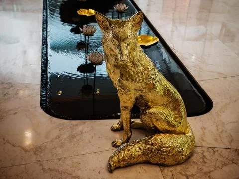 Golden wolf statue Stock Photos