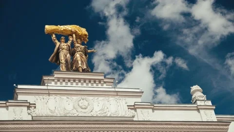 Golden workers statue on arch, Soviet Union monument, exhibition complex VDNKh Stock-Footage 209947041
