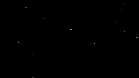 Golden yellow confetti pieces in rectangular shapes scattered against black 스톡 동영상 318311506