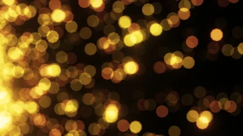Golden yellow shining light particles bokeh looping 3D animation with alpha Stock Footage