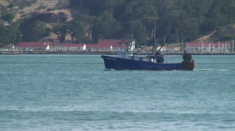 GoldenGateBridge CU Fishing Boat Goes Under Bridge 1 Stock Footage