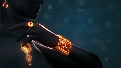 Goldish bijouterie set with red ruby gemstones, ring collar armlet and earring Stock Footage 183997092