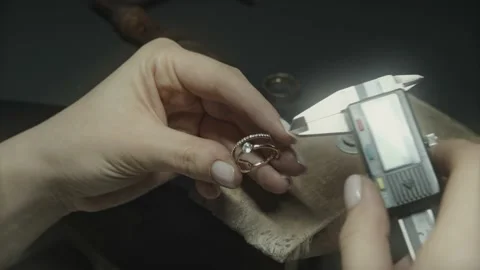 Goldsmith designing new diamond ring Stock Footage 238832644