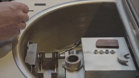 Goldsmith forging wedding ring in machine Stock Footage 82189664