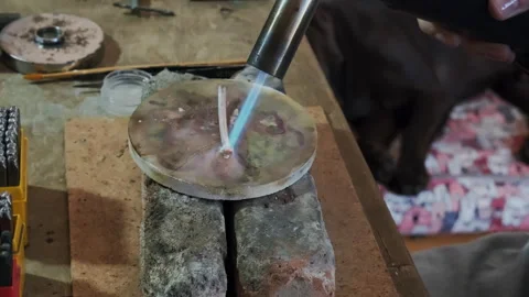 Goldsmith heating silver ring blank with gas torch. Jewelry handicraft Video stock 263828209