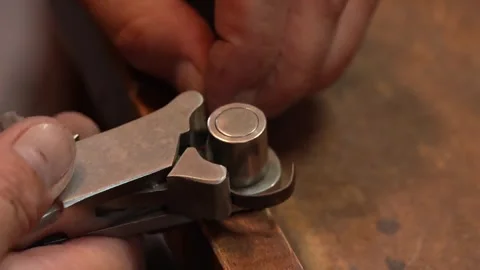 Goldsmith jewelry ring making process ajdusting and polish gold ring Stock-Footage 248447123