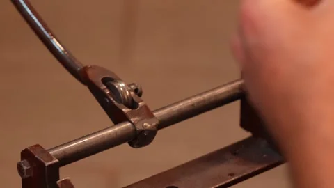 Goldsmith jewelry ring making process ajdusting and polish gold ring Stock Footage 248447169
